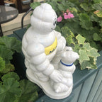 Michelin Man With His Dog
