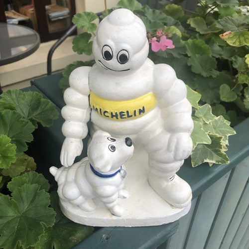 Michelin Man With His Dog