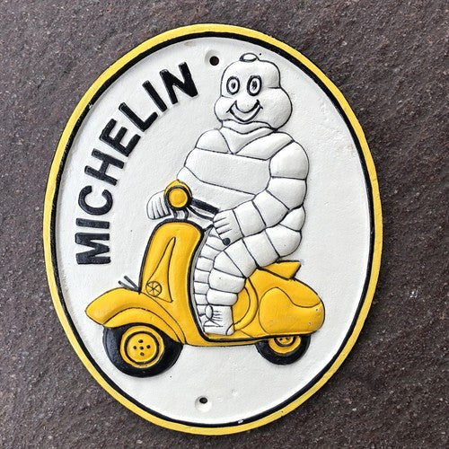 Michelin Man Two Cast Iron Signs