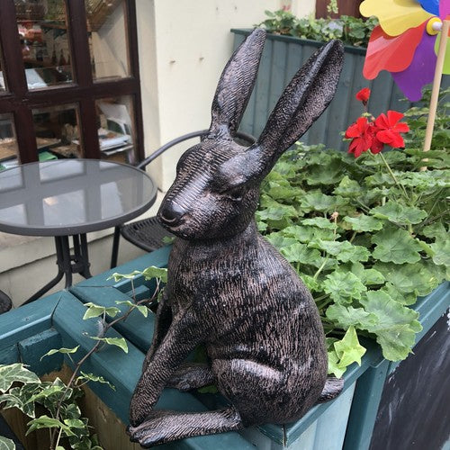 Hate Cast Iron Statue
