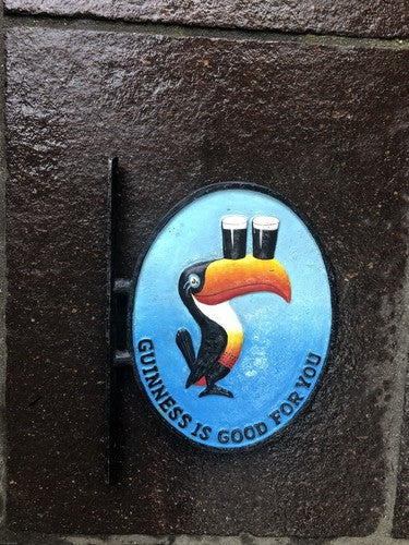 Guinness Double Faced Cast Iron Wall Mounted