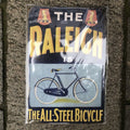 The Raleigh Is The All Steel Bicycle Metal Sign