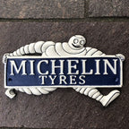 Michelin Man Two Cast Iron Signs