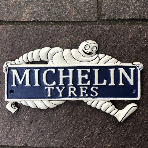 Michelin Man Two Cast Iron Signs