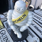 Michelin Man Cast Iron On Swivel Chair