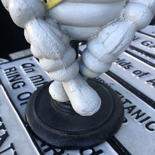 Michelin Man Cast Iron On Swivel Chair