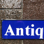 Antiques Enamel Sign