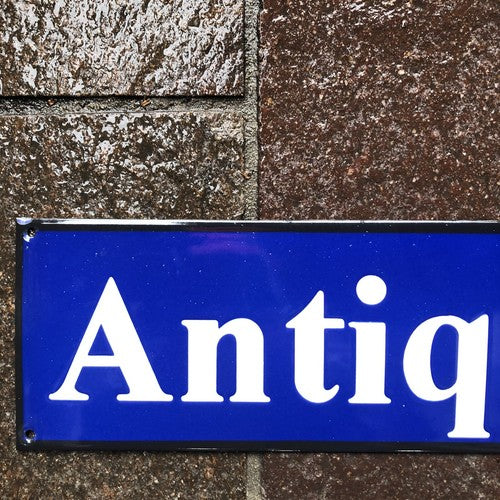 Antiques Enamel Sign