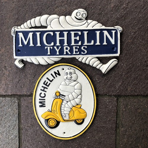 Michelin Man Two Cast Iron Signs