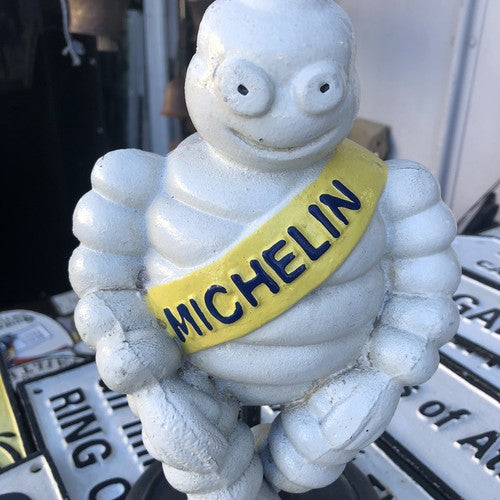 Michelin Man Cast Iron On Swivel Chair