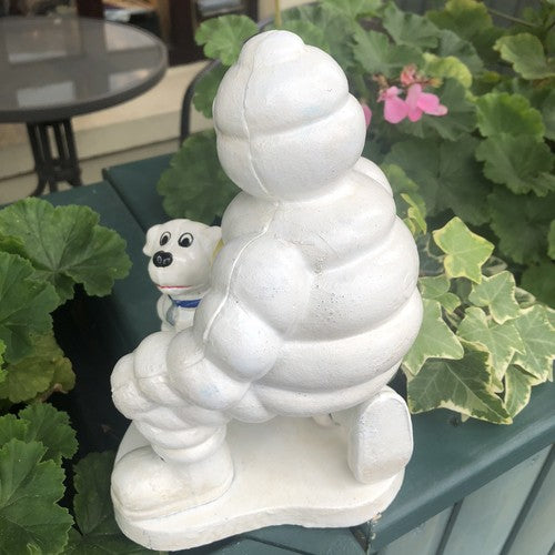 Michelin Man With His Dog