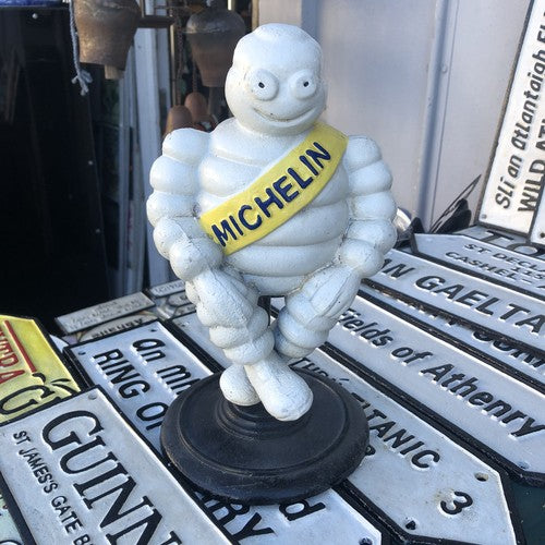 Michelin Man Cast Iron On Swivel Chair