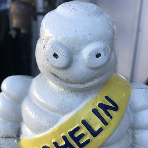 Michelin Man Cast Iron On Swivel Chair