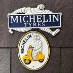 Michelin Man Two Cast Iron Signs