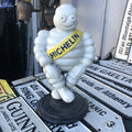 Michelin Man Cast Iron On Swivel Chair