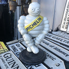 Michelin Man Cast Iron On Swivel Chair