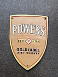 Powers Gold Label Cast Iron Sign