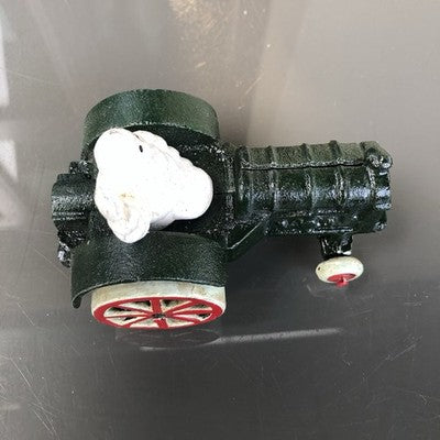 Michelin Man In Tractor Cast Iron