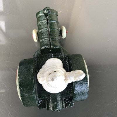 Michelin Man In Tractor Cast Iron