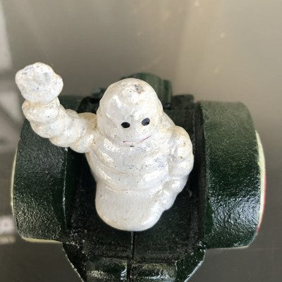 Michelin Man In Tractor Cast Iron